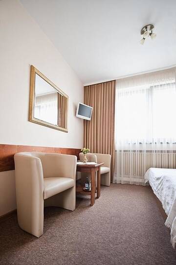 Фото номера Двухместный номер с 2 отдельными кроватями Мотели A&amp;P Motel г. Миколув 7