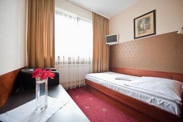 Фото номера Двухместный номер с 2 отдельными кроватями Мотели A&amp;P Motel г. Миколув 8