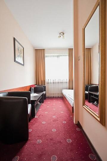 Фото номера Двухместный номер с 2 отдельными кроватями Мотели A&amp;P Motel г. Миколув 10